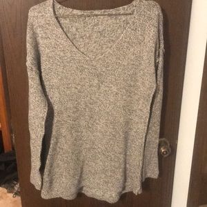White and black specked sweater